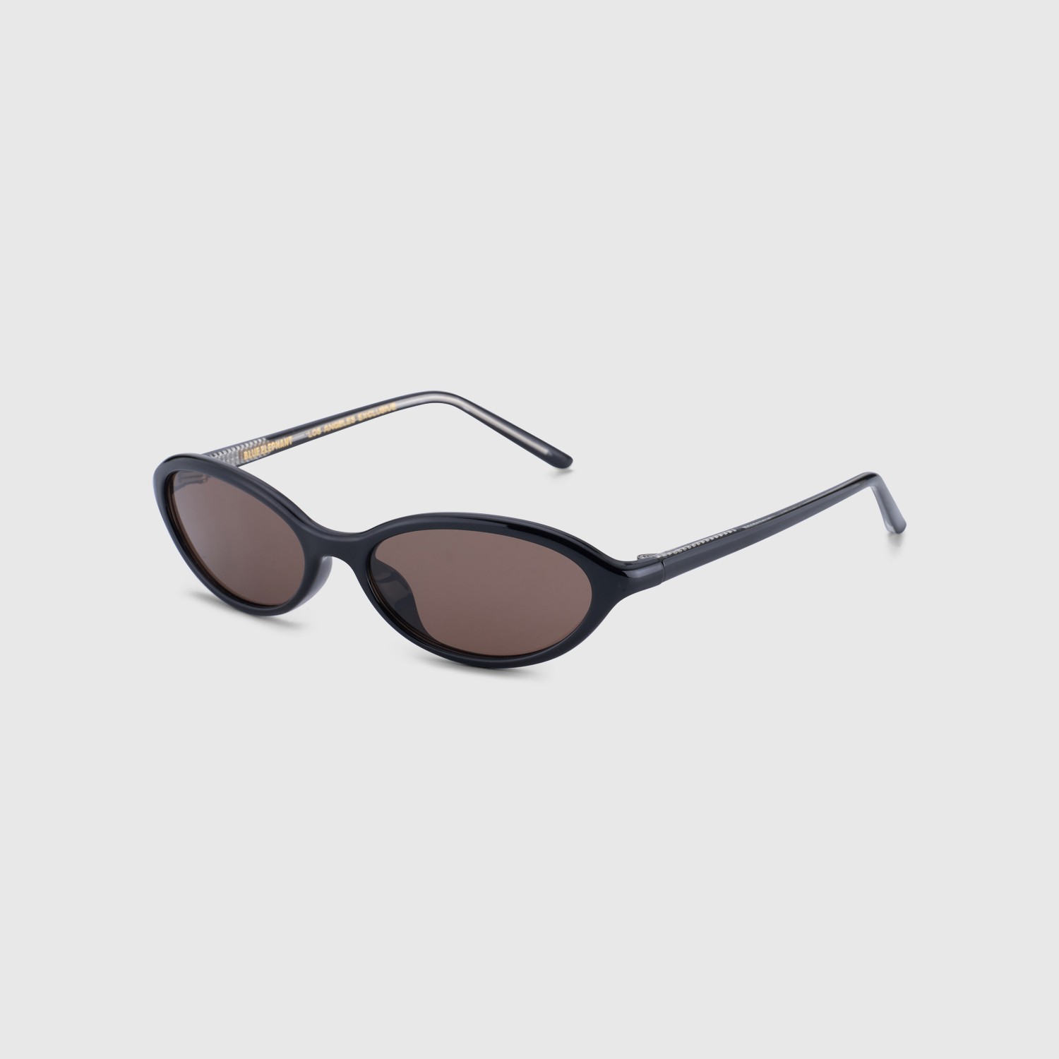 Blue Elephant SOUR-S everyday sunglasses in black, slim oval frame with brown tinted lenses